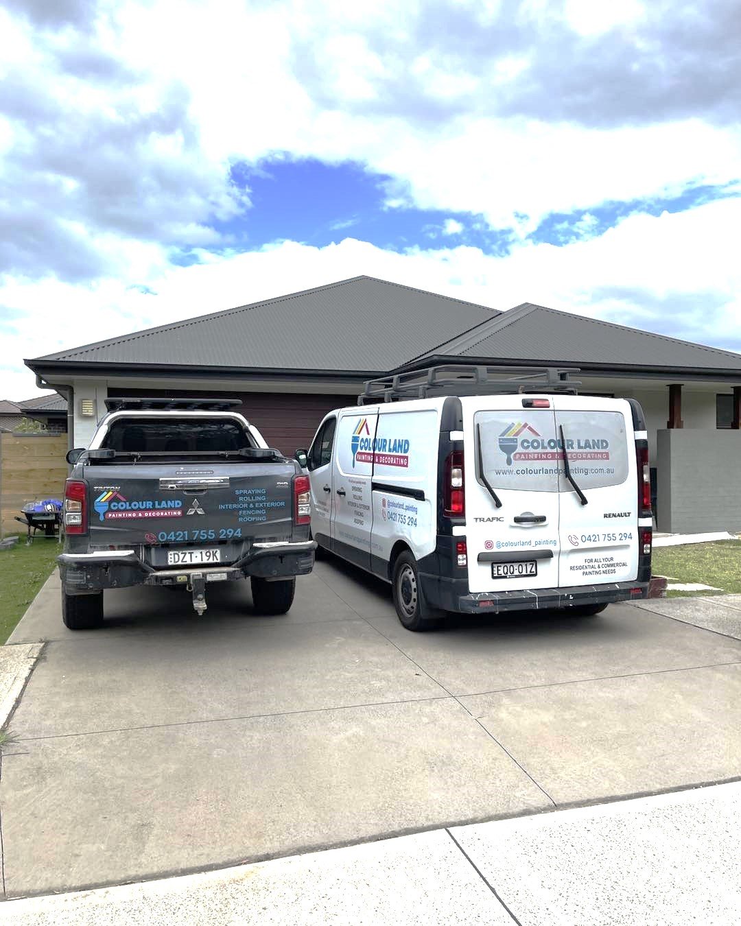 Colourland Painting branded ute and van parked at a Wollongong job site, a fully insured local painting team