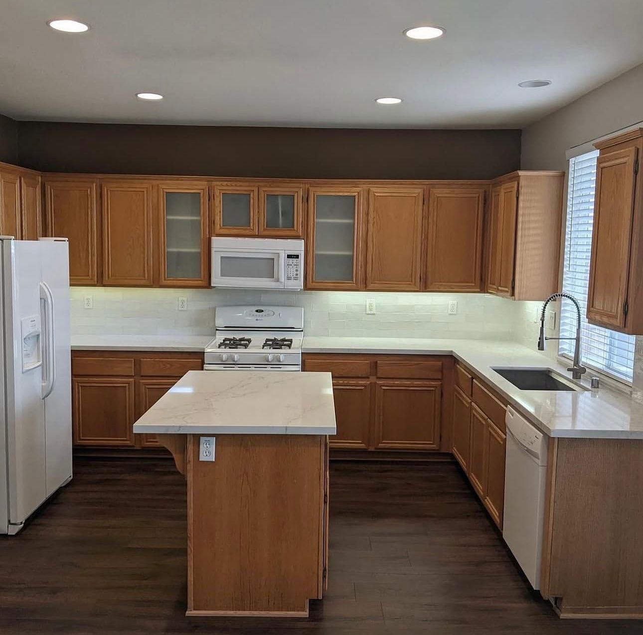 Dated timber kitchen cabinets in a Wollongong home before kitchen cabinet painting
