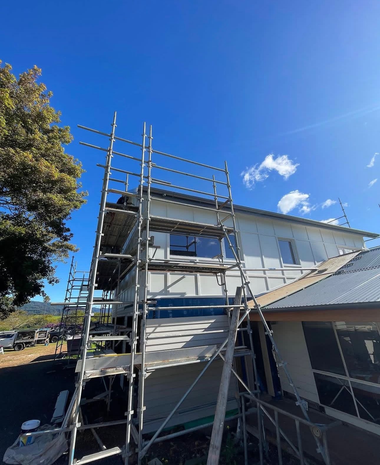 Roof Painting: A Wollongong Painter’s Honest Guide 3 Scaffolded home during exterior and roof painting in the Illawarra