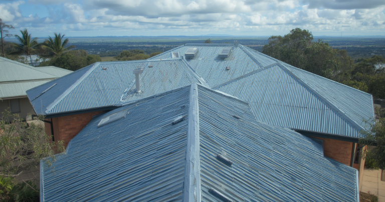 Colorbond Roof Painting in the Illawarra — What You Need to Know 5 Colorbond roof being primed for repainting in coastal Wollongong Illawarra